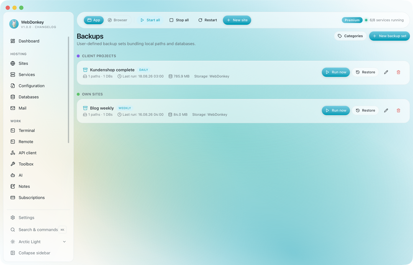 Backups page with two sets by category, each with schedule, last run and total size
